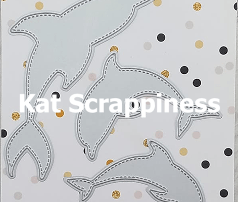 Winner of the Kat Scrappiness “Stitched Dolphin Die Set” Giveaway!